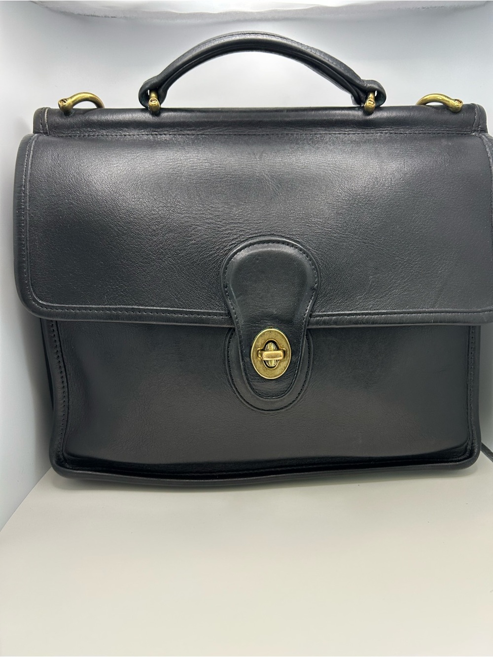 Vintage Coach 9927 Black Leather Top-Handle Satchel with Turn-Lock Closure.